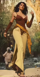 a woman is walking through the woods while wearing a dress