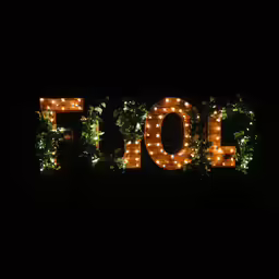 lighted marquee text with flowers