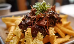 some type of chocolate food on a brown plate