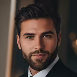 a man with a beard and a suit