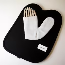 oven mitts are placed in a black oven mitt