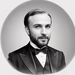 a man is dressed in a suit and tie