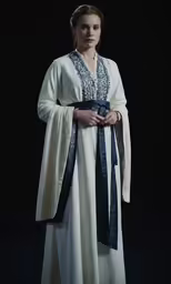 woman dressed in renaissance clothing posing