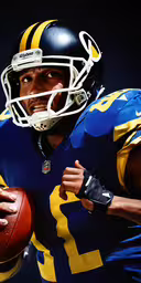 a photograph of a man in uniform holding a football,the football player is holding the ball