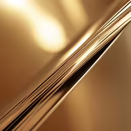 a closeup of a very shiny gold metal sheet