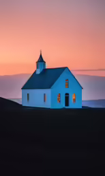 a large white church with a clock on the side