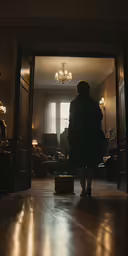 a woman walking in a dimly lit room