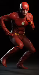 a man dressed up in a flash costume running