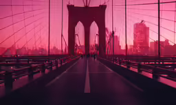 a long walkway with an image of the skyline over a bridge