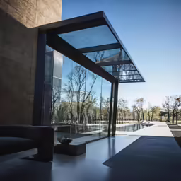a black and glass building is shown in this image