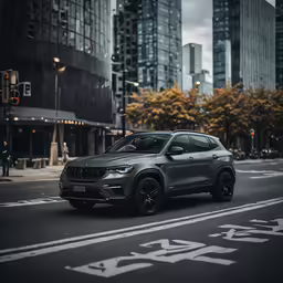 an suv driving down a city street next to tall buildings