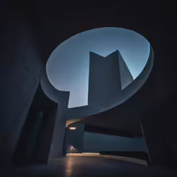 a very dark room with some kind of architecture in it