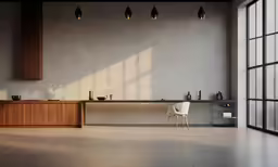 a chair sits at the desk with lots of windows