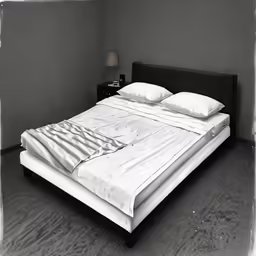 a bed with a large white cover and pillows