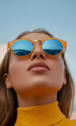 woman in golden and blue sunglasses