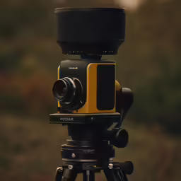 a small video camera sitting on top of a tripod