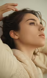 a young woman is wearing a pair of ear piercings