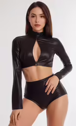 a woman with an open body wearing a leather outfit