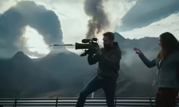 a woman taking a picture of a man with a camera