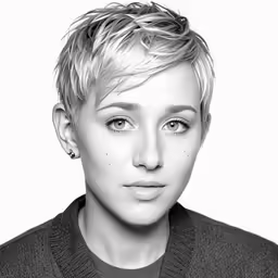 a woman wearing a sweater looking into the camera