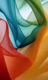 multi - colored ribbons stacked next to each other