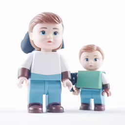some toy figurines are sitting in front of white background