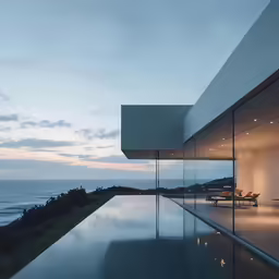 the modern swimming pool is near a beach