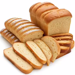 a group of fresh bread loaves next to each other