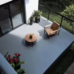 a wood chair and table on an outdoor deck
