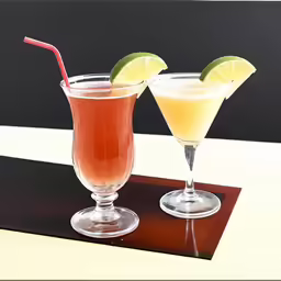 two alcoholic beverages sitting on top of a wooden table
