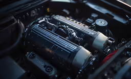 engine of car with electronic control displayed indoors