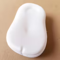 there is a small, white object on the table