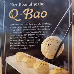 three scoops of ice cream being served on two trays