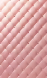 pink textured leather with stitching and rivets