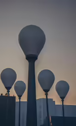 the poles hold all three light poles up to create an interesting display