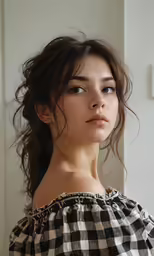 a woman is posing for a selfie