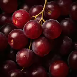 a bunch of berries that are covered in water