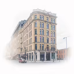 an old city building with lots of windows and trees