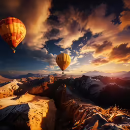 hot air balloons flying over a mountainous landscape