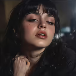 a woman with wet makeup is posing