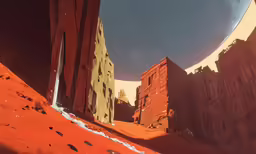 some orange and yellow buildings on the edge of a red hill