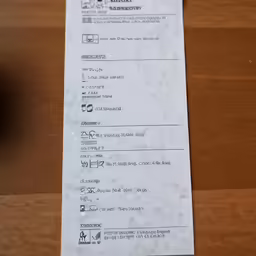 a close up of a receipt on a table