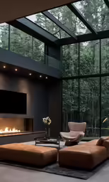 a contemporary living room with big windows and glass doors