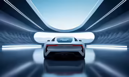 a futuristic car is parked in a tunnel