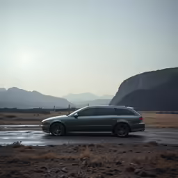 a black car parked on the side of a road