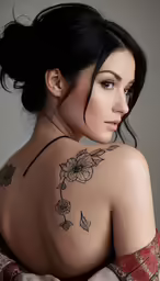an image of a woman that is tattoos