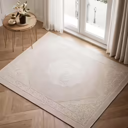 a cream colored rug on wooden flooring next to white curtains