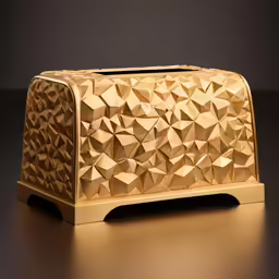 the gold rectangular object is placed on the table