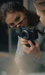 a female photographer with her digital camera