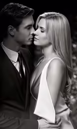 the man is kissing his beautiful girlfriend in black and white